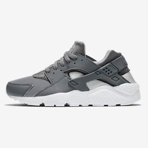 Gray and White Nikes Huaraches